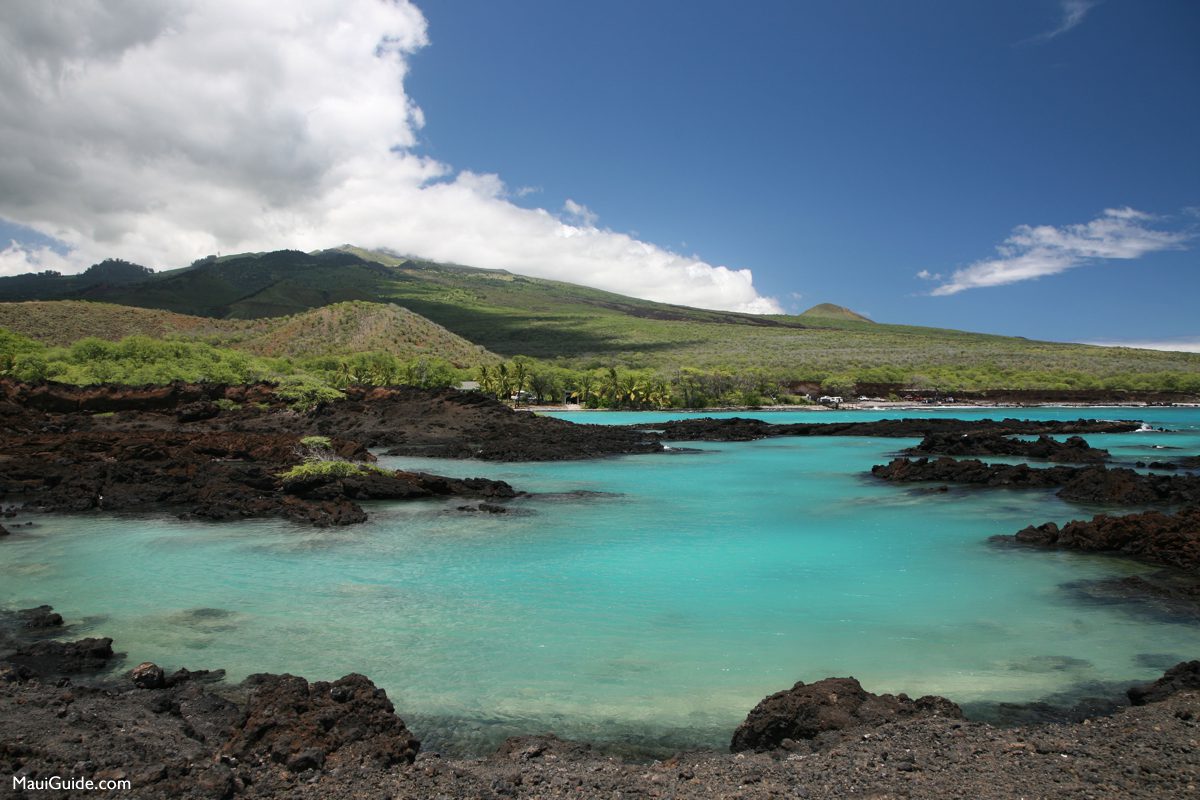 Black lava shoreline and turquoise water near La Perouse on Maui