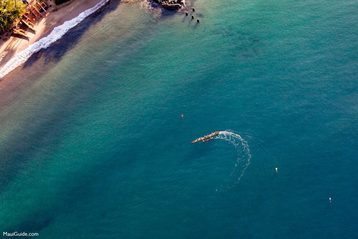 Outrigger canoe paddling near the Maui shoreline