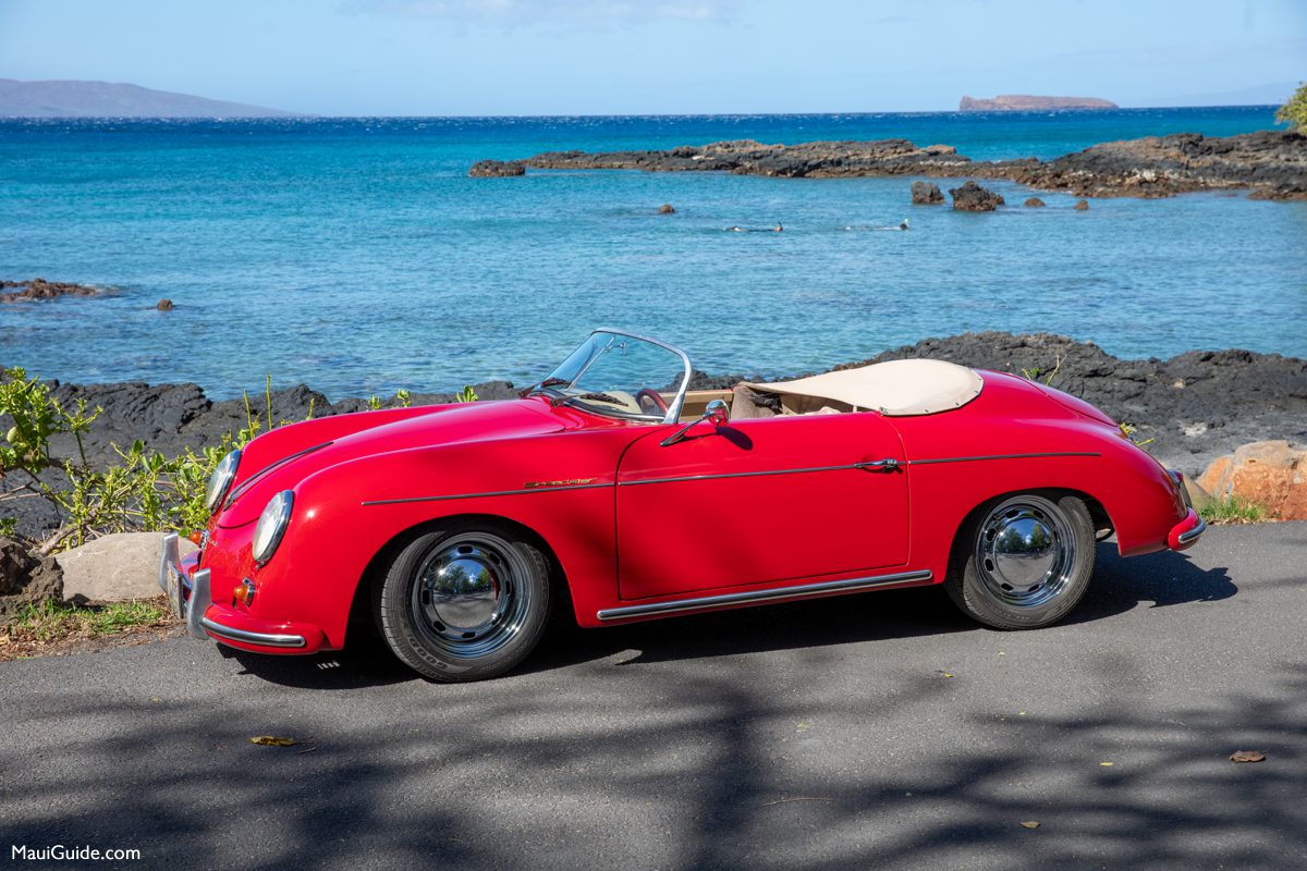 Red Maui Roadsters Speedster beside the ocean