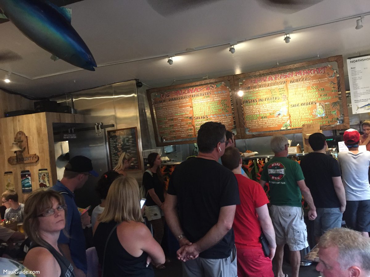 Customers ordering a casual meal at Paia Fish Market on Maui
