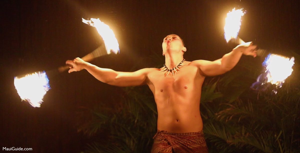 Fire knife dancer performing at Royal Lahaina luau